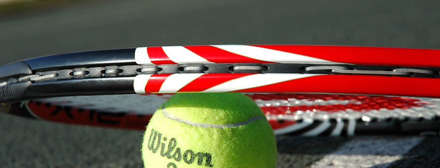 tennis ball and racket